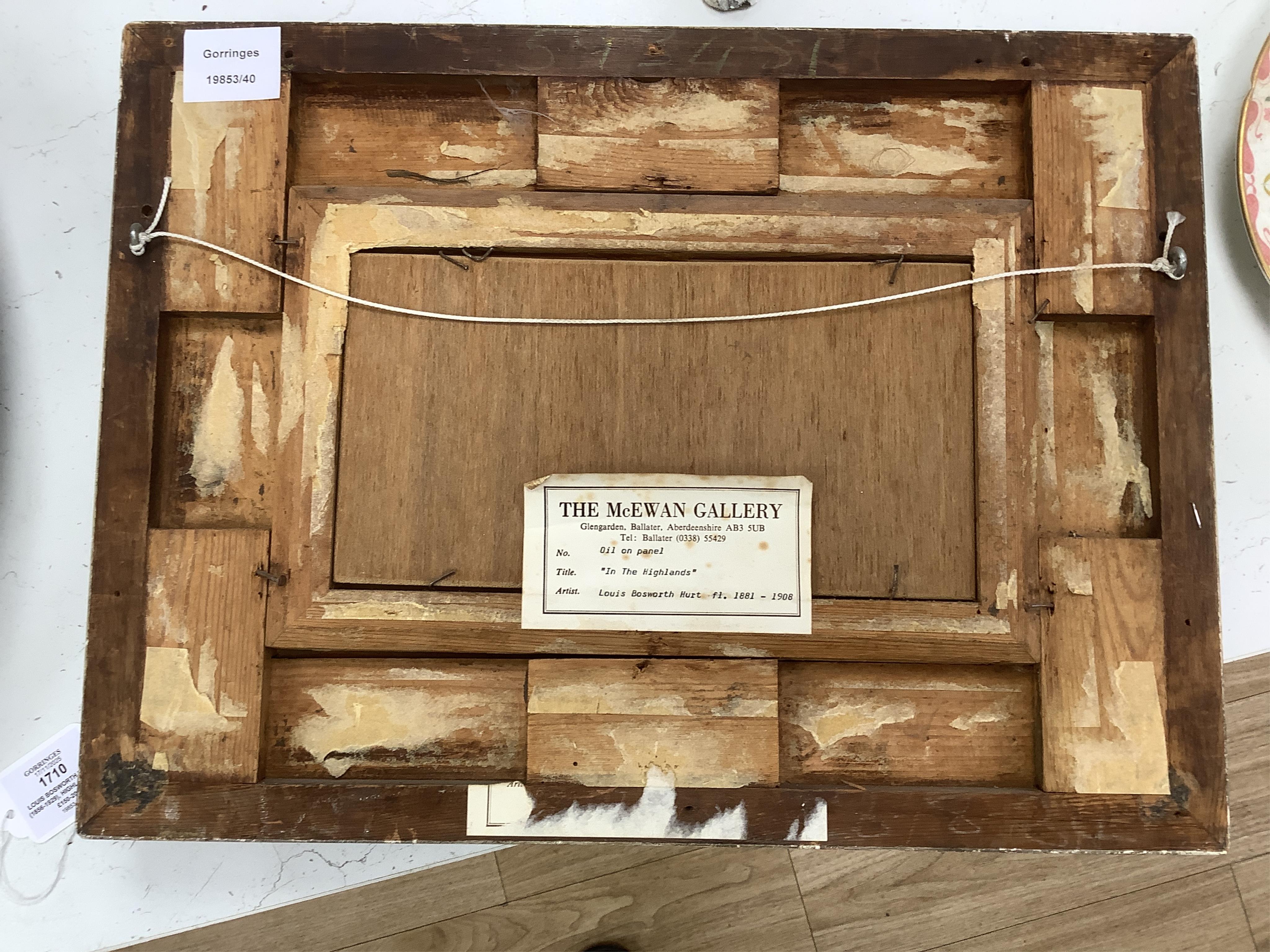 Louis Bosworth Hurt (1856-1929), Highland cattle by a loch, signed, oil on board, 12 x 23cm